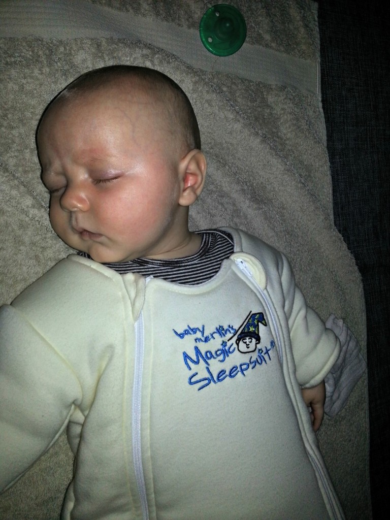 Lil B sleeping soundly on a weekend trip in Germany at the AirB&B.  Not just another Baby Gear! The Baby Merlin Magic Sleepsuit really can help your baby to sleep anywhere!!!